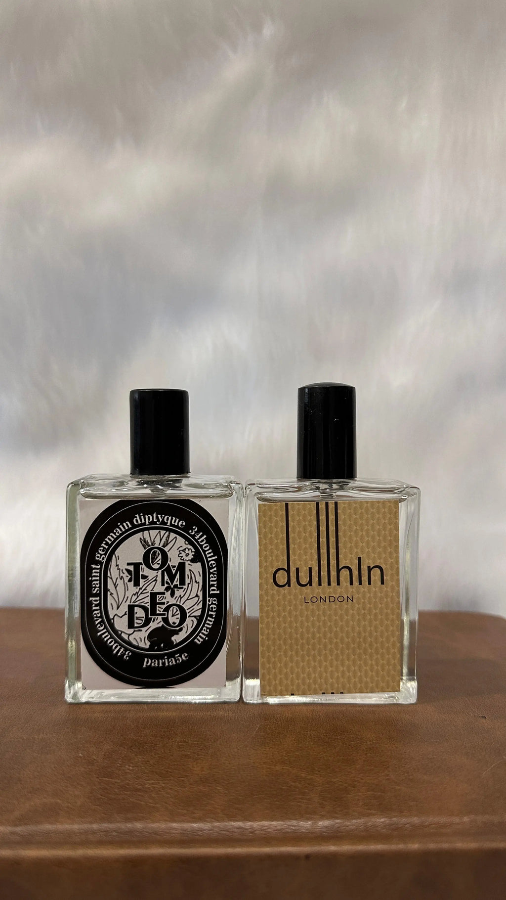 Long Lasting Fragrance Set for Men & Women featuring Tum Deo and Dullhin perfumes on a brown surface.